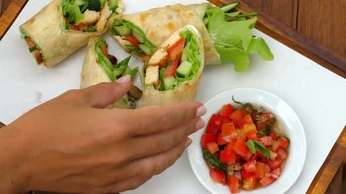 Appetizing Chicken and Vegetable Wraps on Display