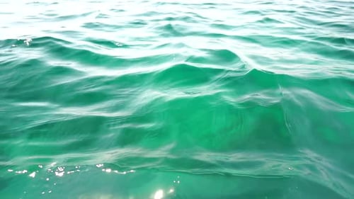Sea Water Surface Camera Flies Over the Calm Azure Sea Nobody Holiday Recreation Concept Abstract