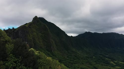 Beautiful natural landscape of Hawaii, aerial view of green massive mountain ridge.