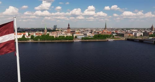 Scenic Cityscape with Waving Flag Aerial View