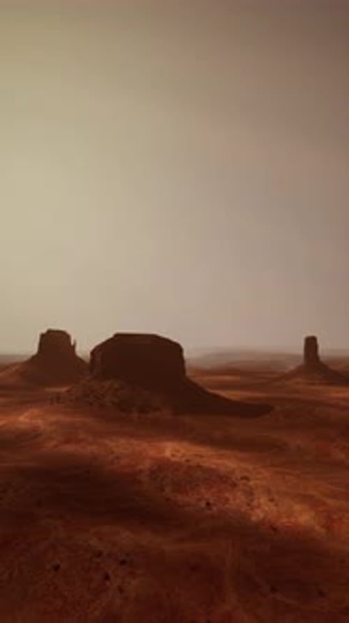 Arid Desert Landscape With Distant Rocks
