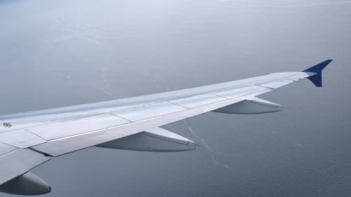 Airbus A320 Airplane Wing in Flight, Passenger Window View