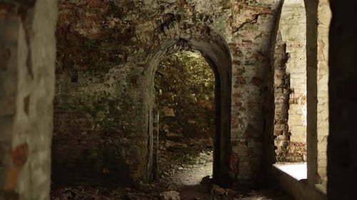 Interior of Eroding Building With Broken Doorway and Light