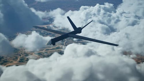 Military Surveillance Drone Flying Above Clouds