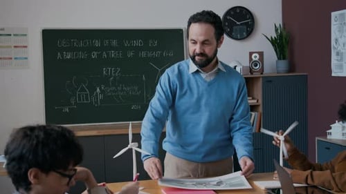 Teacher Discusses Wind Turbine Energy with Students