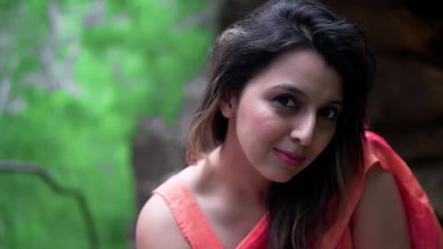 Beautiful Woman Smiling Gently in Nature Setting