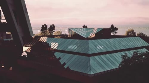 Diseño moderno con tejados angulares de cristal en un entorno tranquilo