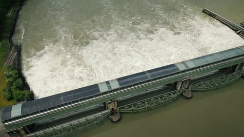 Hydroelectric water dam on river Rhine with huge strong flowing water stream