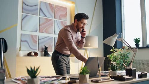 Dissatisfied Ceo Arguing Phone Standing Office Workplace. Nervous Business Man Calling Subordinate