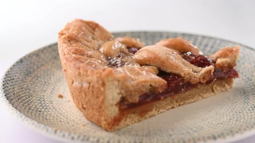 Delicious Slice of Cherry Pie on Plate