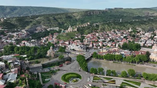 Aerial views over the Kura River in the city of Tbilisi in Georgia, Metekhi.