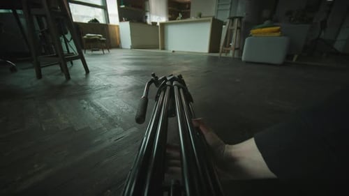 In the Studio Hands Man Holds and Moves Tripod Camera Shooting Cinema Production Filmmaker
