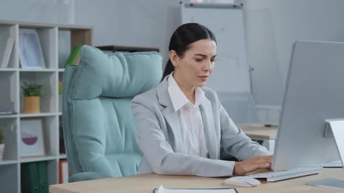 Portrait of Uncertain Beautiful Caucasian Woman Throwing Up Hands While She Works in Office Not Sure