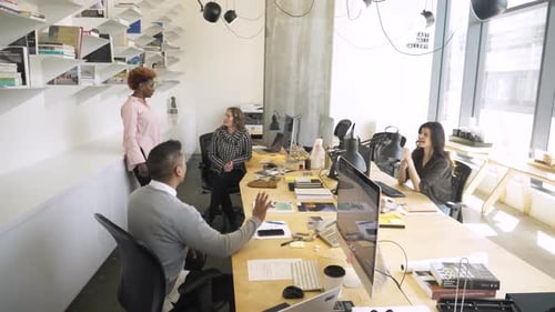 Business People Talking Working In Open Plan Office