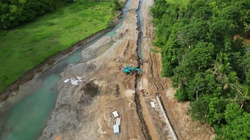 An Excavator Working On The Road Construction Site Near Sto Domingo In Virac, Catanduanes Philippine