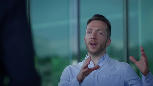 A Confident and Professional Businessman Engaged in an Insightful Dialogue and Discussion