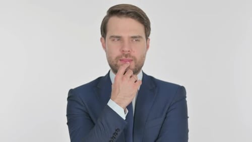 Pensive Young Businessman Thinking and getting Idea on White Background