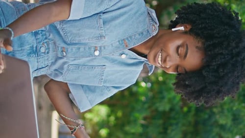 Teenager Speaking Video Call By Laptop in Park Closeup Girl Talking Vertical