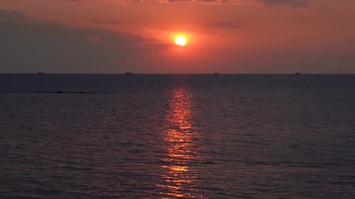 Beautiful aerial sunset view over sea surface beautiful wave. Amazing light sunset or sunrise sky ov