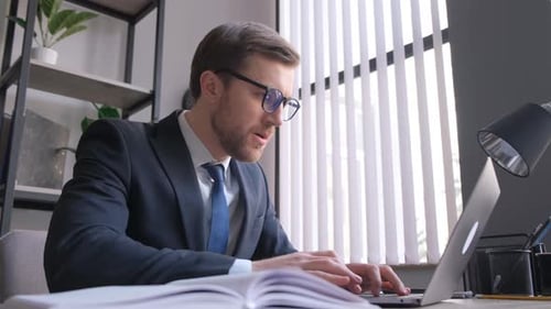 Angry Young Man Stressed Computer Operational Problem or Breakdown