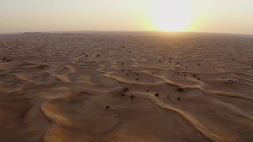 Aerial Drone Shot Of The Endless Desert Sand Dunes During Sunset