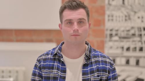 Young Man Looking Serious Indoors Portrait