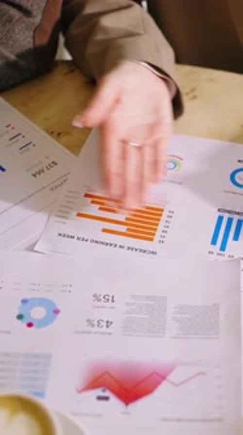 Data Analysis Meeting with Charts and Graphs