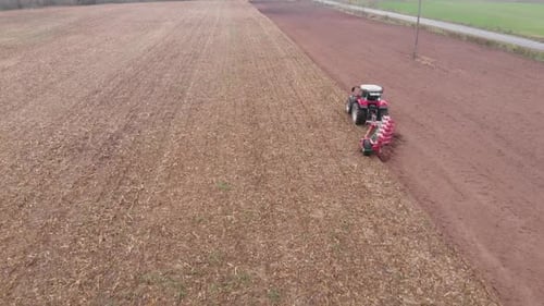 Tractor plowing the field in Ukraine