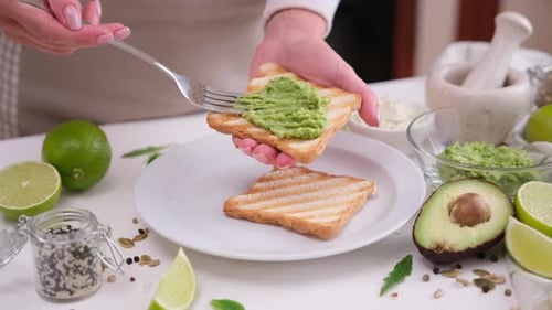 Preparing Delicious Avocado Toast with Fresh Ingredients