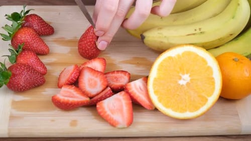cutting strawberry