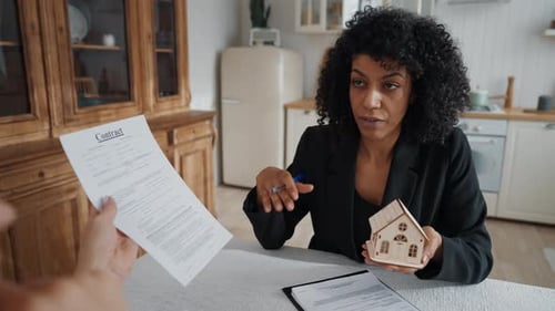 Buy Real Estate Married Couple Discussing Contract for Mortgage Female Agent African American Woman