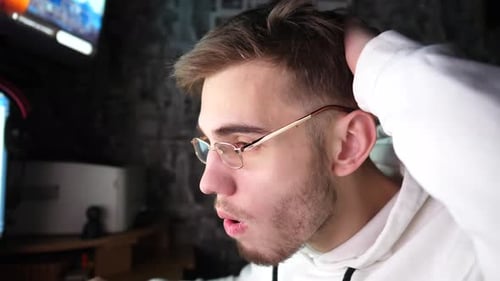 Financial Analyst Working on Computer at Night Male Trader Analyzing Realtime Foreign Exchange