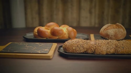 Selection of Loaves of Bread on Table