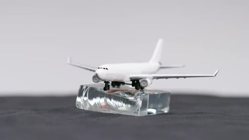 Toy Airplane on Clear Stand