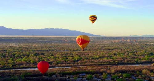 Hot Air Balloon Above Albuquerque, New Mexico Desert By Aerial Drone Slow Motion