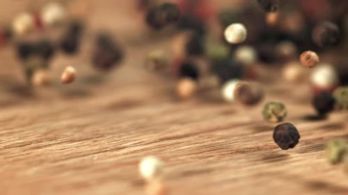 Peppercorns Falling in Slow Motion Close Up