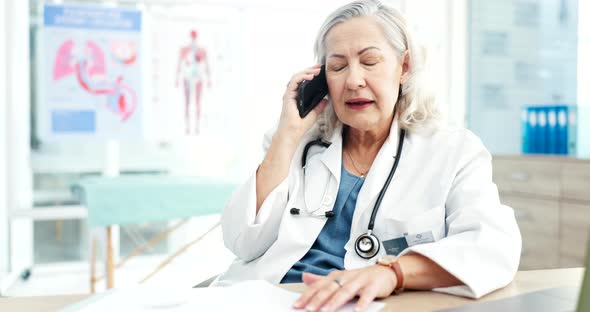 Doctor, phone call and woman in hospital for communication, expert ...
