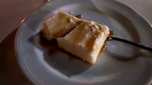 Galaktoboureko is a baked custard pudding with a sweet sauce