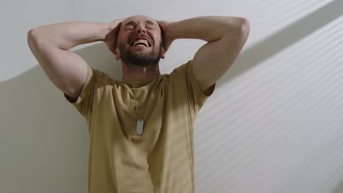 Soldier in Military Uniform Having Mental Break Down from PTSD