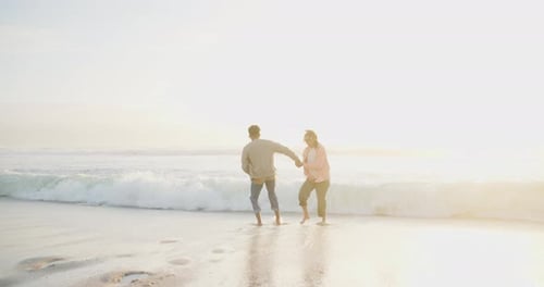 Couple, holding hands and running on beach, sunset and security on vacation or summer holiday