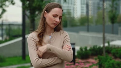 One Anxious Young Woman is Standing on the Street Feeling Anxious The Woman is Experiencing Anxiety