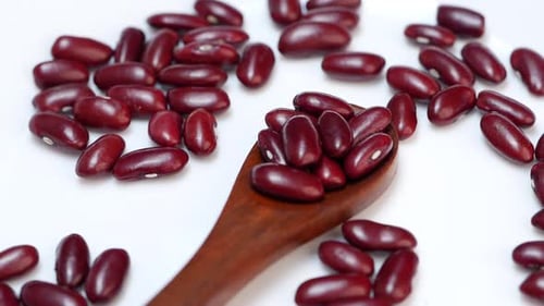 Red Kidney Beans with Wooden Spoon on Plate
