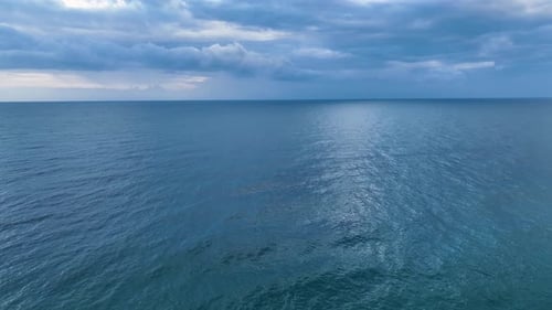 Cinematic Mediterranean Serenity Drone Explores the Vastness Amidst Cloudy Sunset