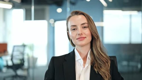 Smiling Professional Businesswoman in Modern Office