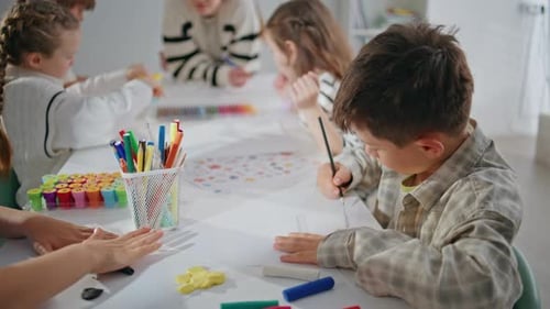 Children Draw Together at Art Class