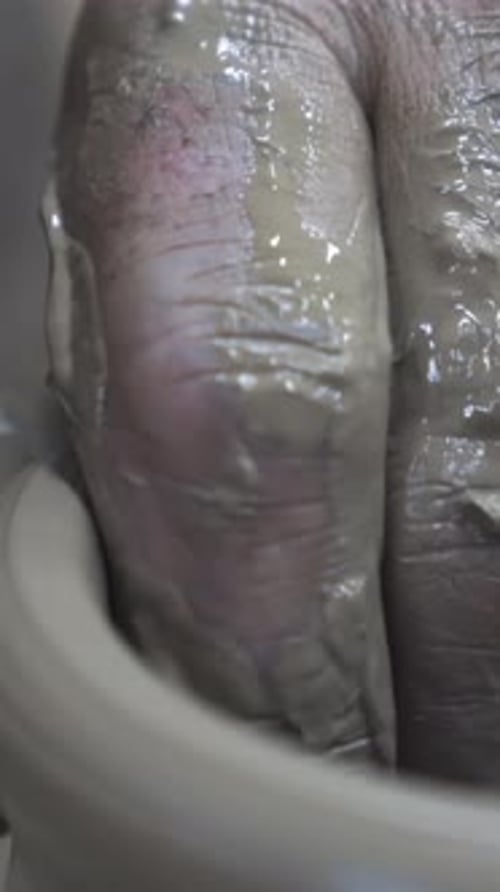 Close Up of Hands of a Potter While Creating a Clay Jar Ceramics Production Concept Stock Footage