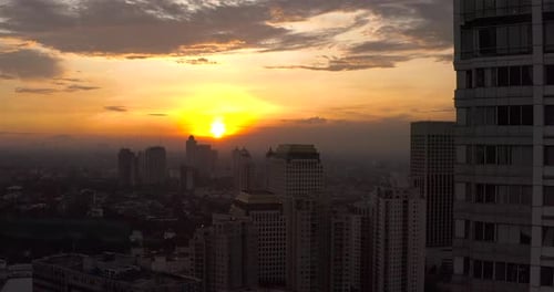 Sunset between building city