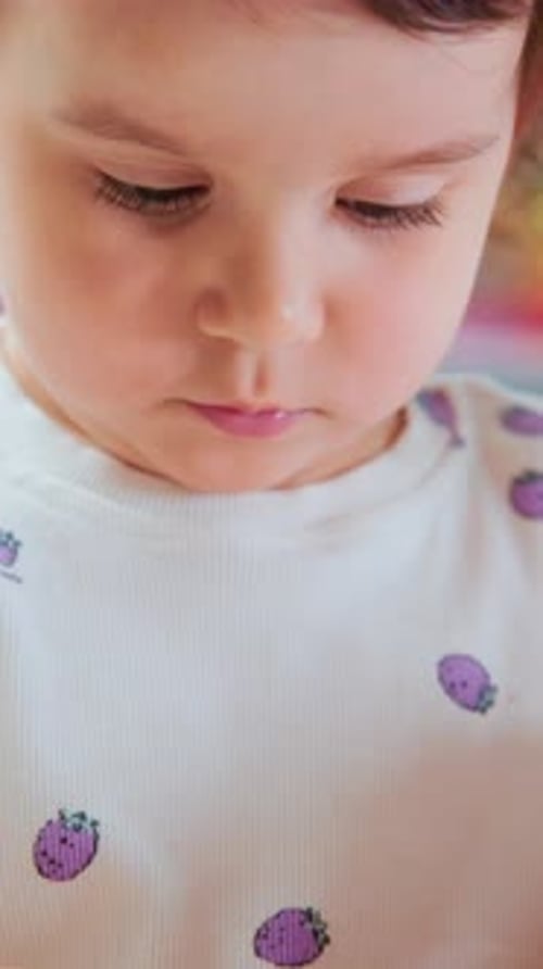 Young Child Carefully Sorts Pieces Young Kid Purposefully Lines Up Tiny Pieces During Creative