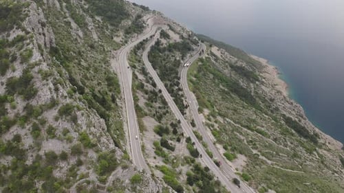 A beautiful view, on a winding road in the mountains.