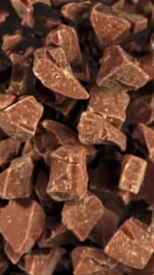 Super Slow Motion Pieces of Dark Milk Chocolate Filmed on a Highspeed Camera at 1000 Fps